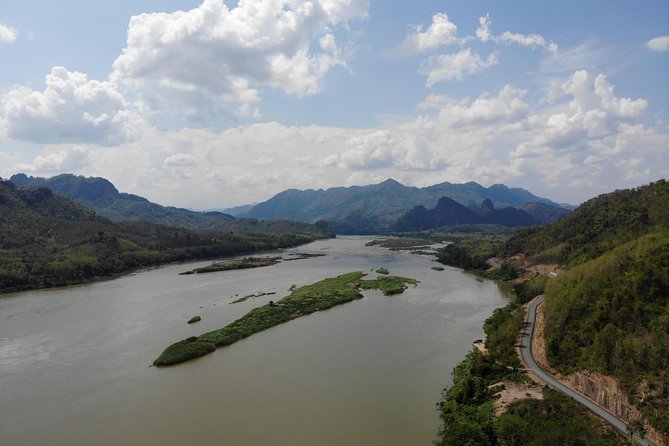 Full day / Half Day Kayaking and Pak Ou Caves with optional sunset cruise - Paddling toward Pak Ou through quiet northern Laos