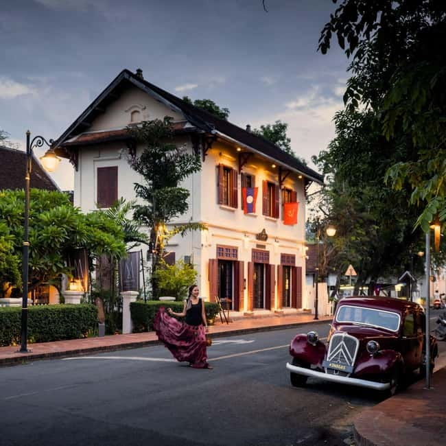 Luang Prabang: Audio-Guided City Tour in Electric Car - Monasteries and the spiritual character of the city