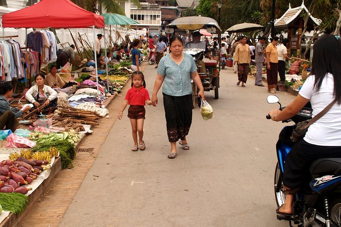 Luang Prabang Early Morning Alms Giving and Wet Market - Why the dawn alms ceremony matters