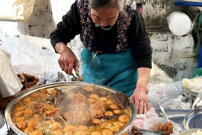 Luang Prabang Evening Food Tour by Tuk-Tuk - Local markets, tea, and ingredients you may not recognize
