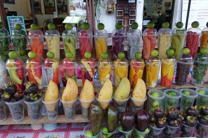 Luang Prabang Evening Food Tour by Tuk-Tuk - Lao BBQ, rice noodles, and family-run food stops