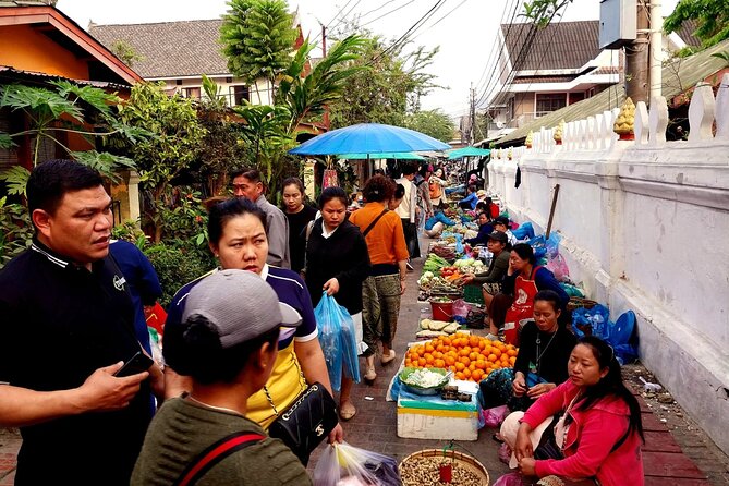 Luang Prabang Foodie Walking Tour and Monk Blessing - Walking through Luang Prabang’s food market