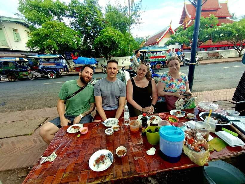 Luang Prabang: Foodie Walking Tour & Monk Blessing - Tasting Lao snacks and the Luang Prabang specialty
