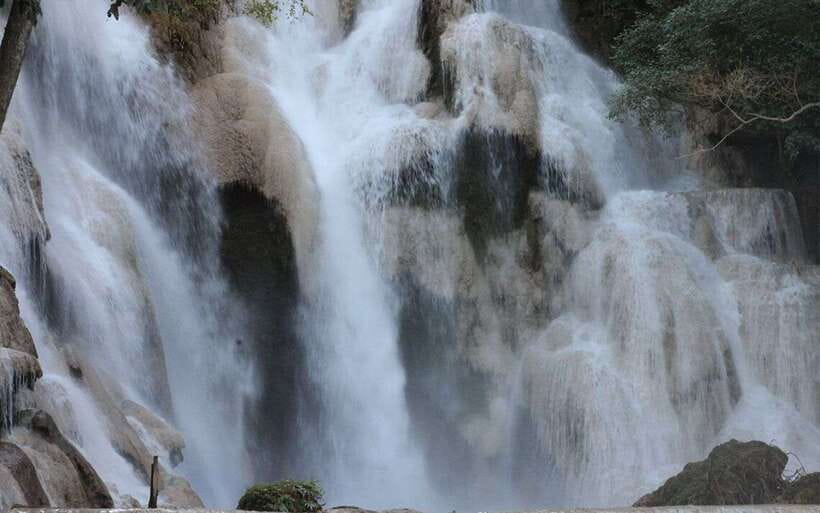 Luang Prabang: Kuang Si Bike Ride & Long-Tail Boat Cruise - Arriving at Kuang Si Waterfall