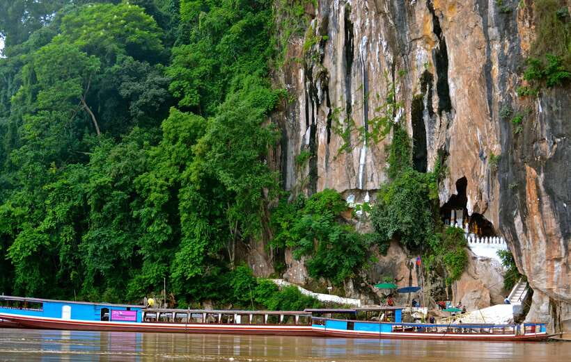 Luang Prabang: Pak Ou Caves & Kuang Si Falls Day Trip - The road to Kuang Si and a stop at Whiskey Village