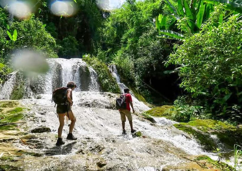 Nong Khiaw: 100 Waterfalls, Nam Ou & Khmu Village Day Tour - Walking through streams and rice paddies