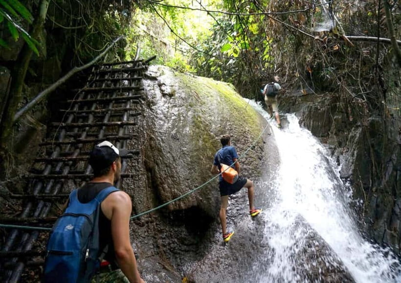 Nong Khiaw: 100 Waterfalls, Nam Ou & Khmu Village Day Tour - Climbing the 100 Waterfalls