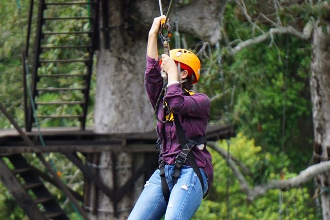 One Day Guided Tour: Kayaking, Zipline & Tubing In The Cave from Vang Vieng - Forest ziplining and the final afternoon stretch