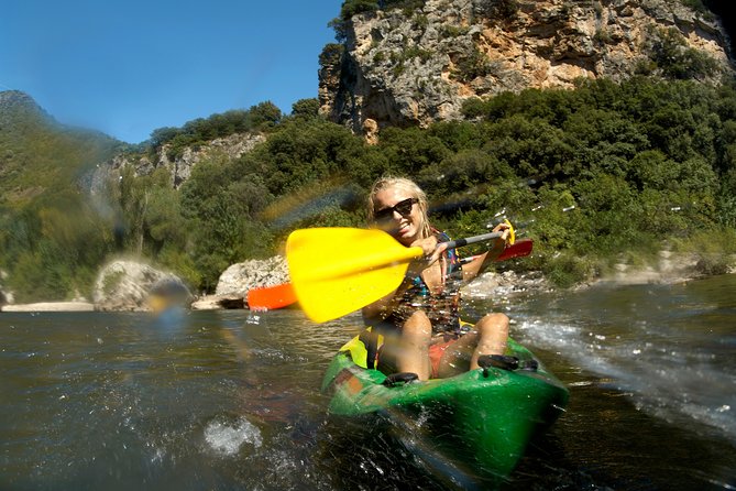 One Day Guided Tour: Kayaking, Zipline & Tubing In The Cave from Vang Vieng - Kayaking the Nam Song for about two hours