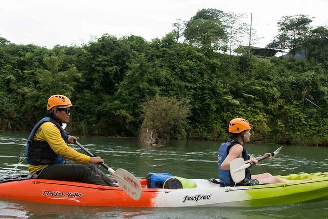 One Day Kayaking, Zipline and Tubing In Cave from Vang Vieng - 9:30 a.m. at Khmu Village and the Nam Song River