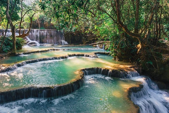 Pak Ou Caves and Kuang Si Fall Day Tour - The Mekong route to Pak Ou Caves