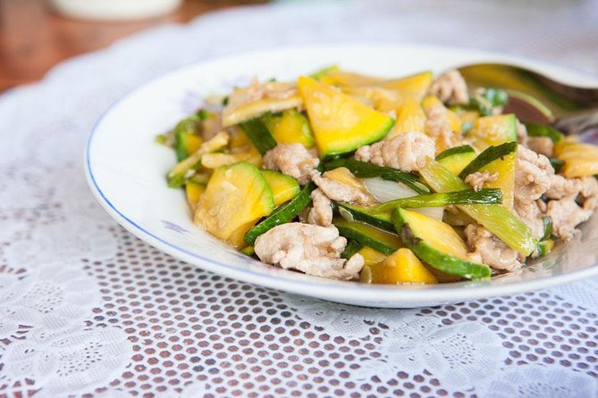 Traditional Market Tour and Private Laotian Cooking Class with a Local - Cooking two or three Lao dishes