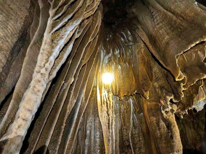 Vang Vieng: Day Tour with Kayaking, Ziplining, and Rafting - Tubing and hiking at Tham Chang Cave