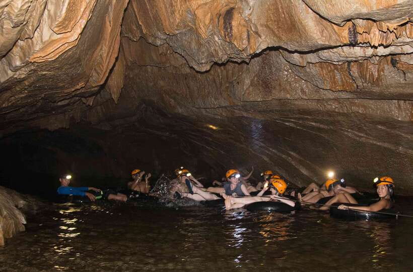 Vang Vieng: Half-Day Zip Lining with Cave Exploration Option - Following the Stream to the Tham None River Bank