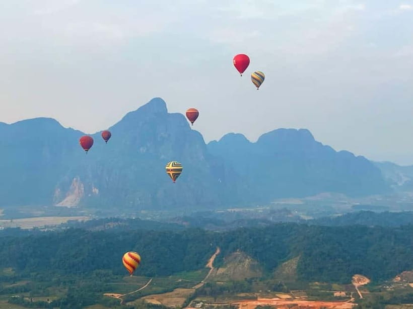 Vang Vieng: Hot Air Balloon Ride with City Hotel Pickup - The afternoon launch and sunset option