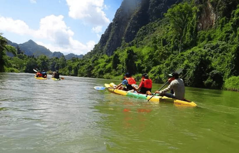 Vang Vieng: Kayaking&Zipline&Water Cave&Tham Chang tour - Ziplining above the forest